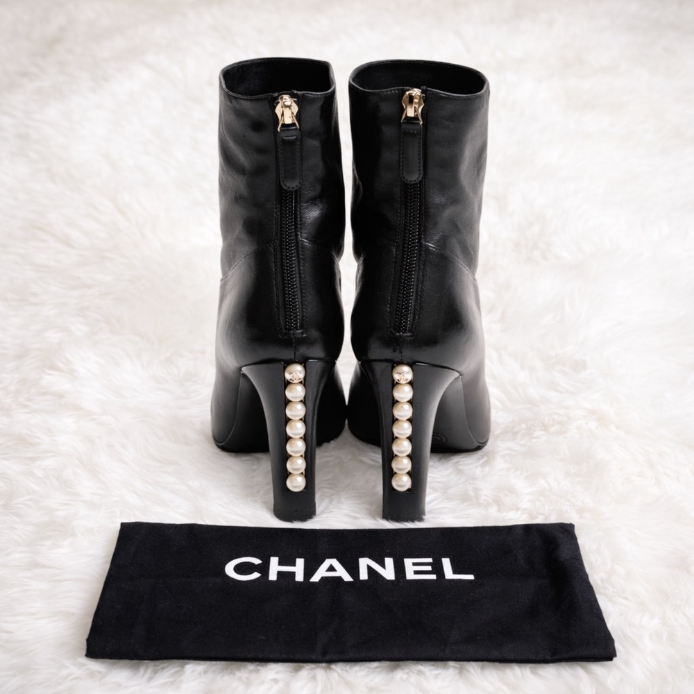 CHANEL Black Heeled Boots with Pearl Accent